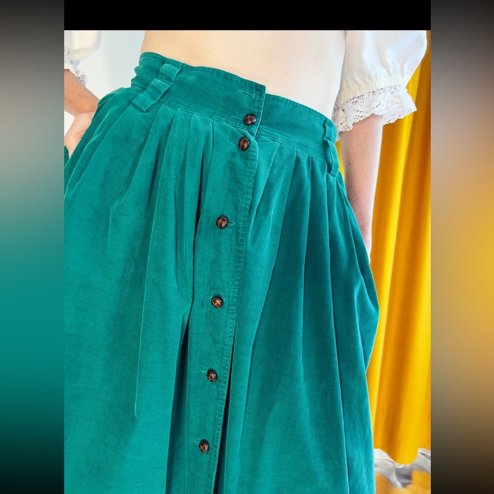 Vintage 80s green corduroy front button midi skirt.